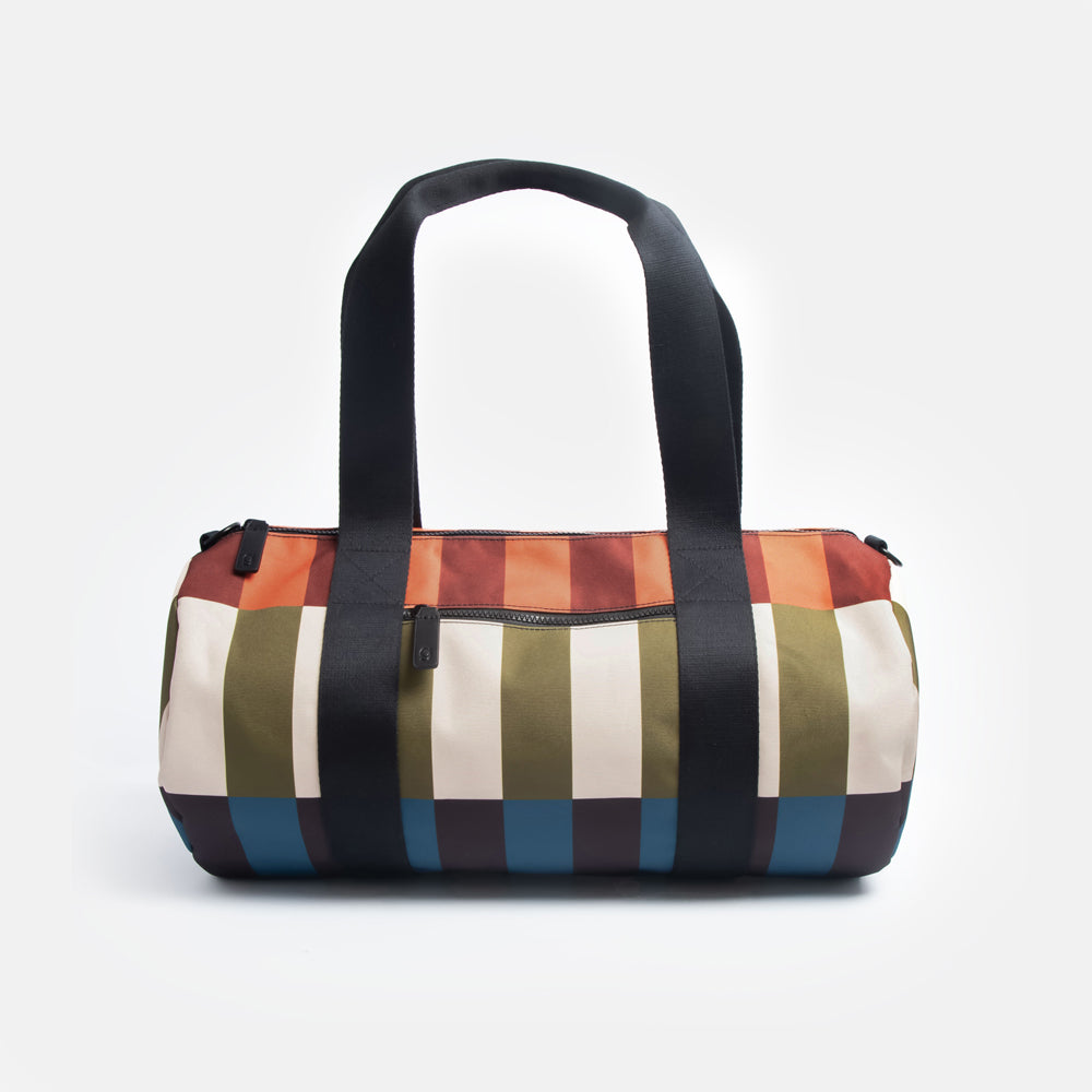 nylon barrel gym bag in retro style stripe design in orange, brown, green, white, blue & black