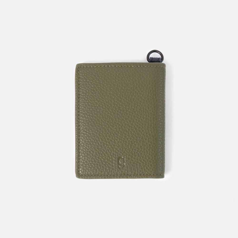 khaki green leather look card holder wallet with embossed 'g' on a white background