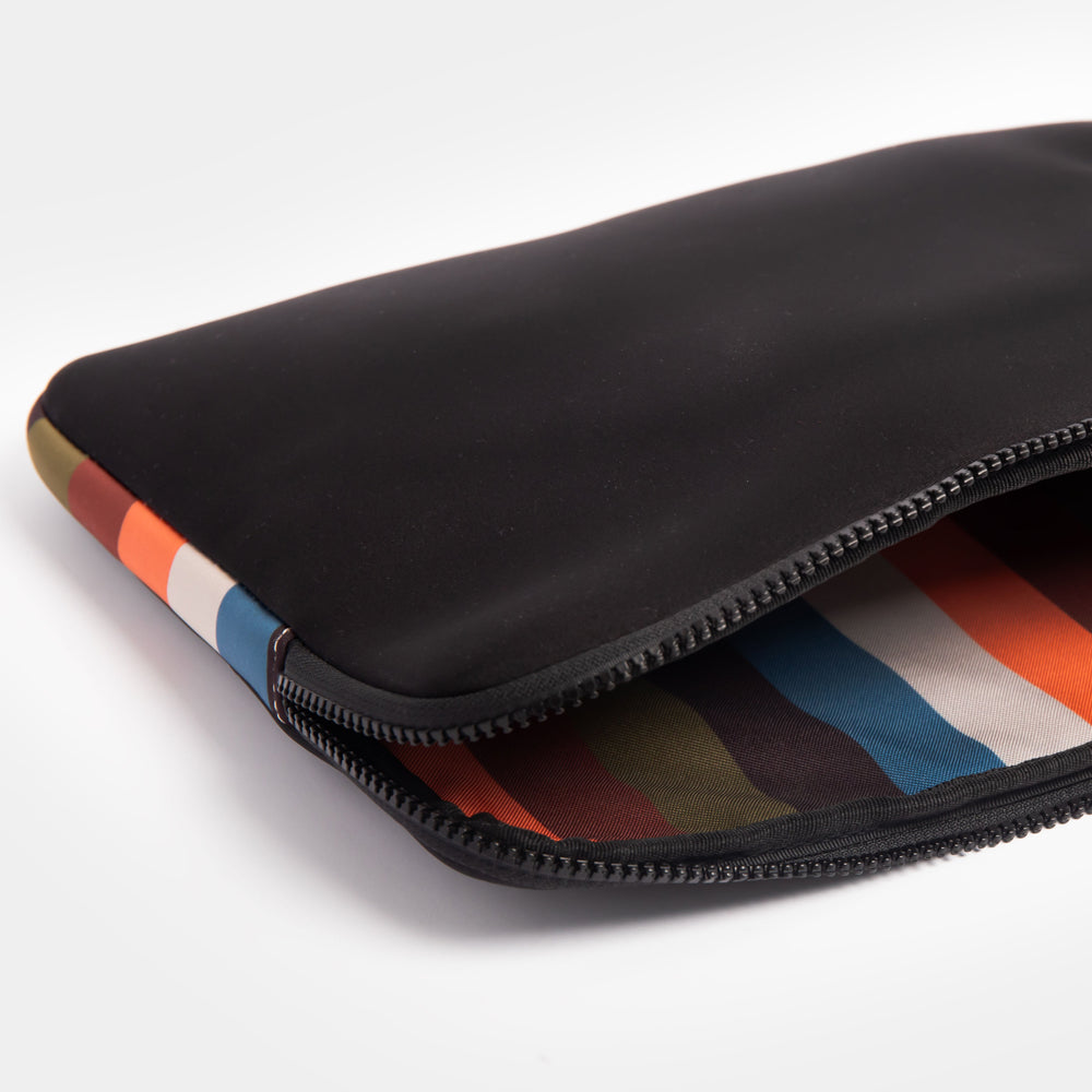 black neoprene 14 inch laptop sleeve with colourful retro stripe trim and lining