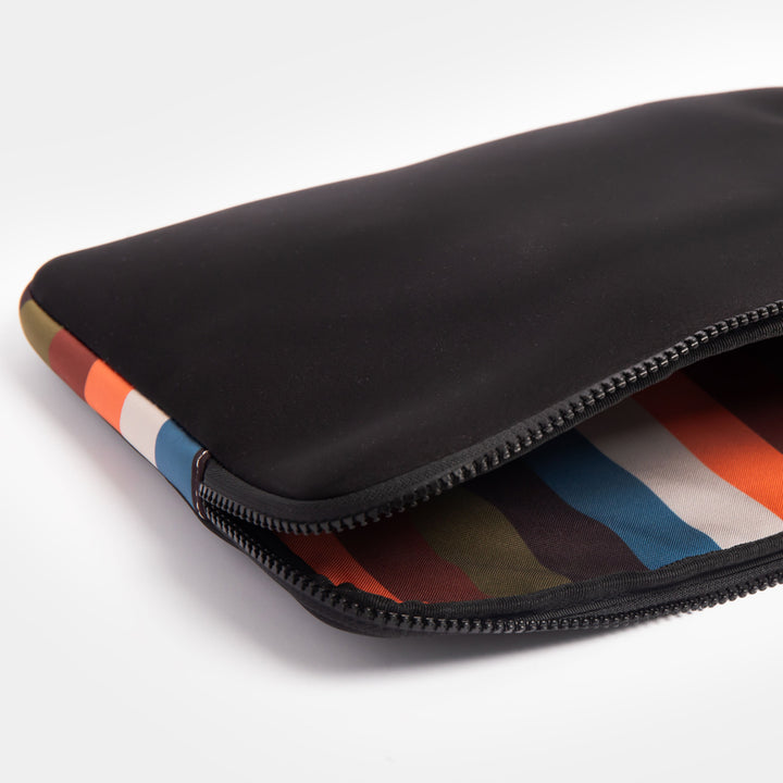 black neoprene 14 inch laptop sleeve with colourful retro stripe trim and lining