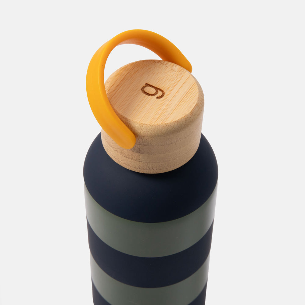 green and blue stripe metal water bottle with wooden lid and yellow carry handle on a white background