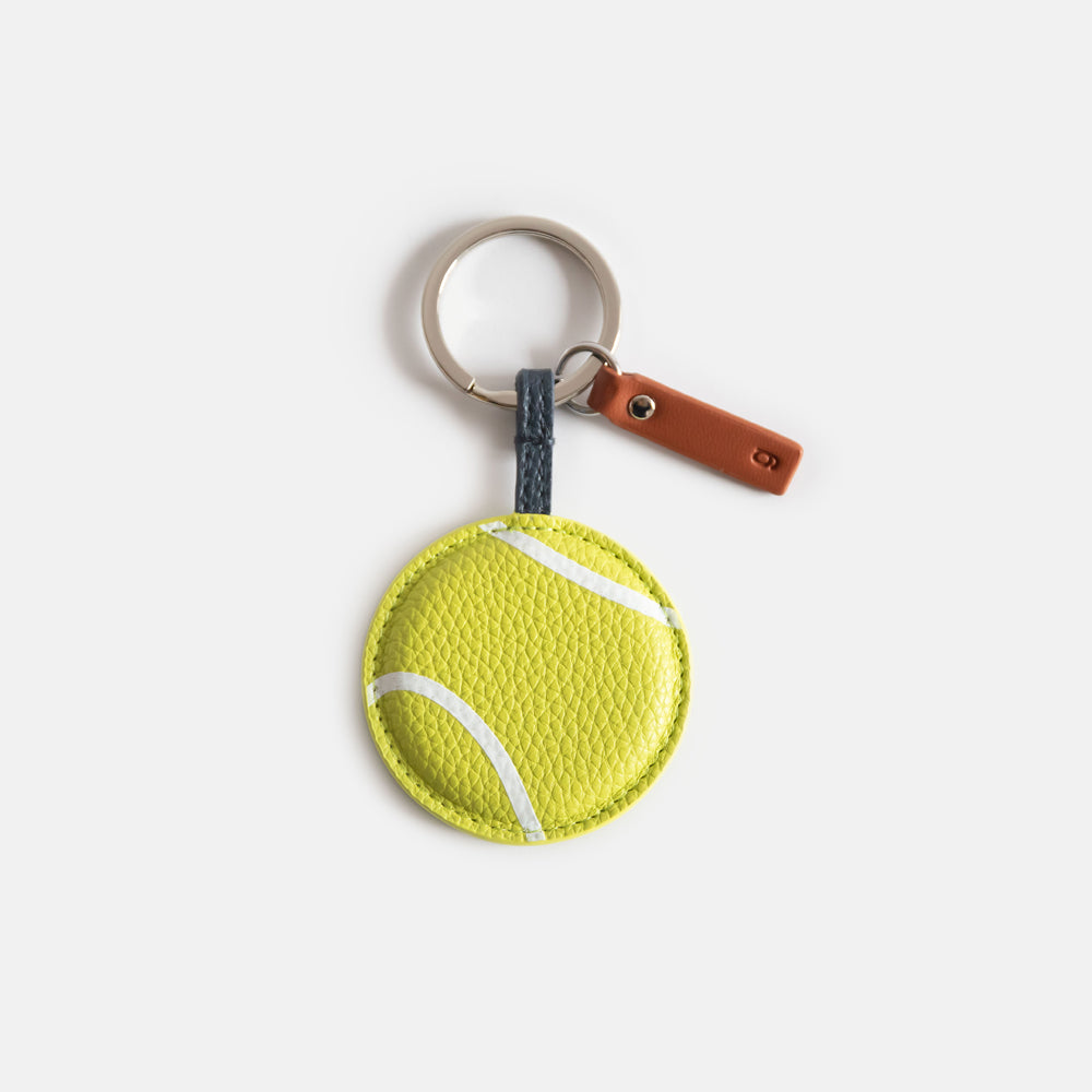 green tennis ball padded keyring with silver o ring and brown leather look tab