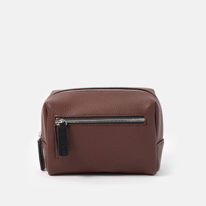 dark purple small ash bag with silver zip and black zip pulls on a white background