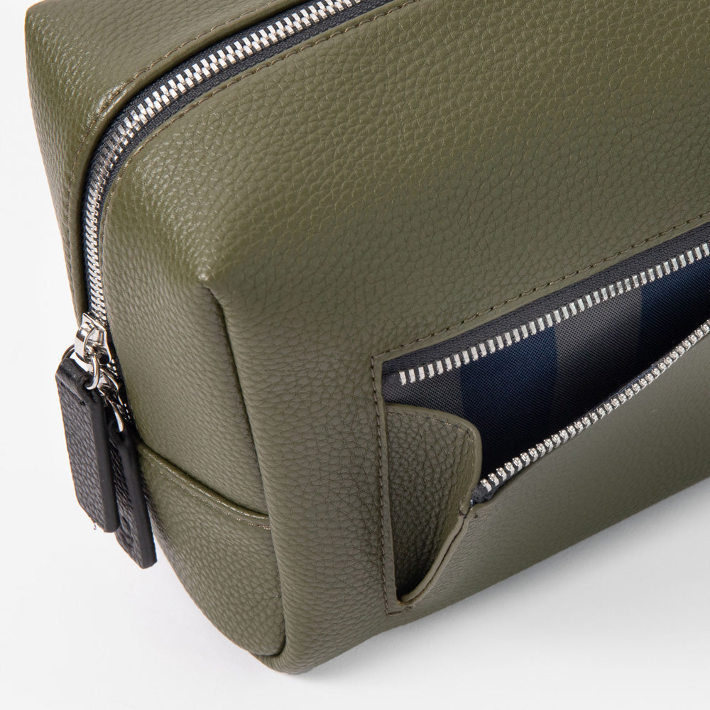 khaki green leather look wash bag with silver zip front pocket with blue and green tripe internal lining
