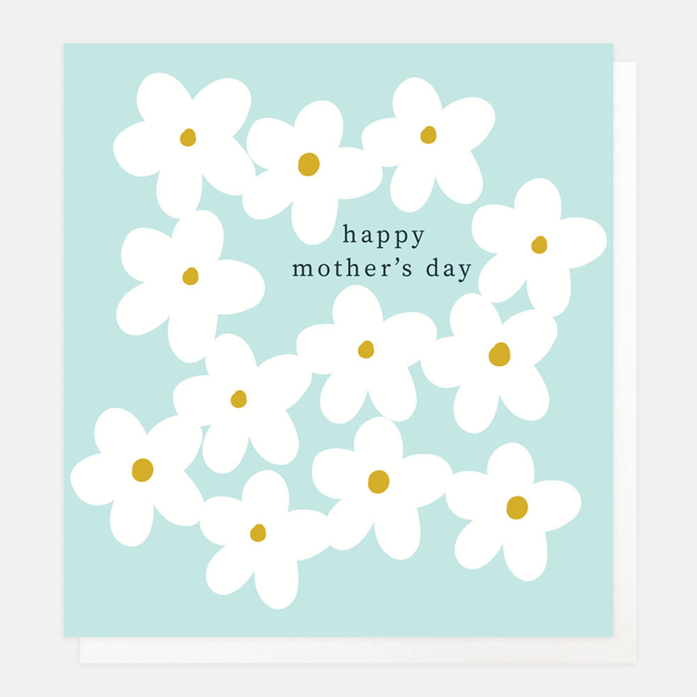 white flowers on blue background happy mother's day card