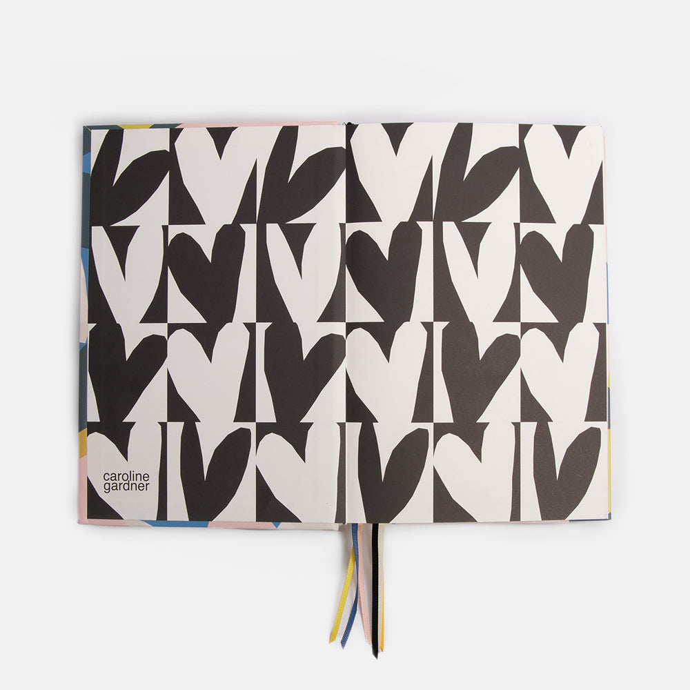 hardback lined notebook with 6 page marker ribbons in colourful confetti hearts design