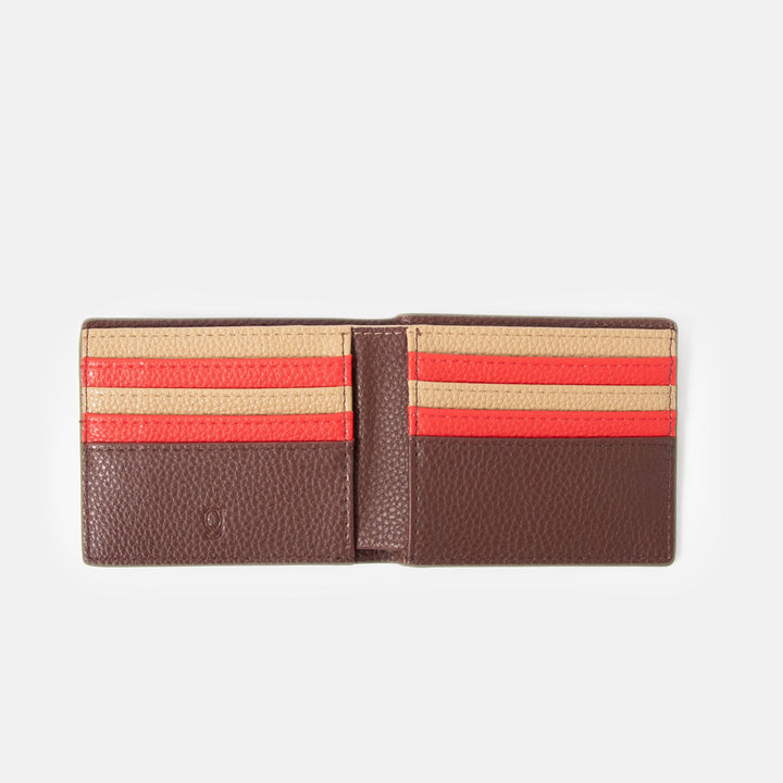 open wallet showing dark purple interior with red and sand colour card slots on a white background