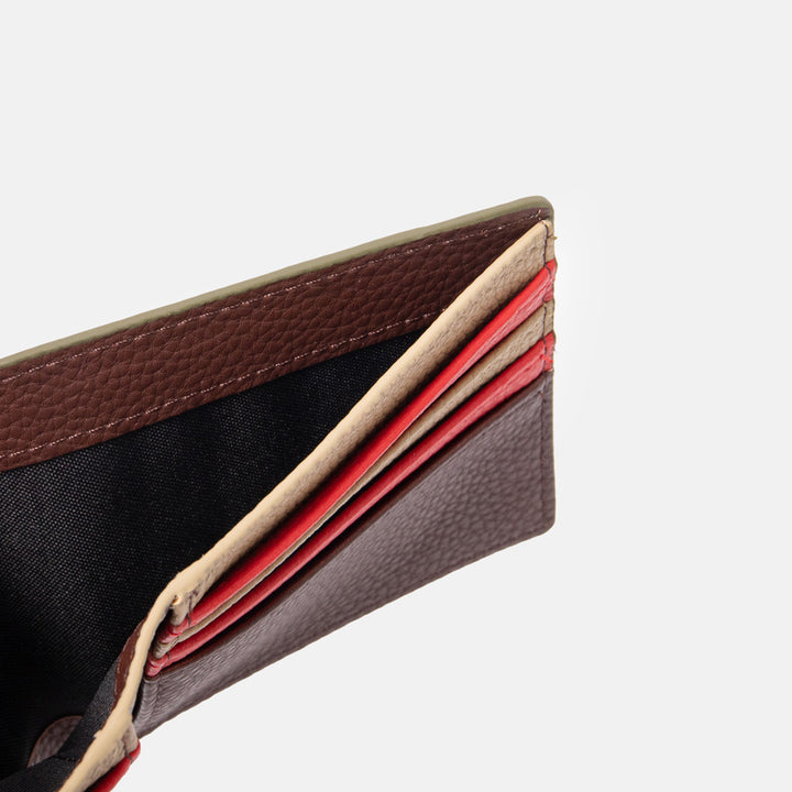 Close-up of a wallet with dark purple  interior on a white background