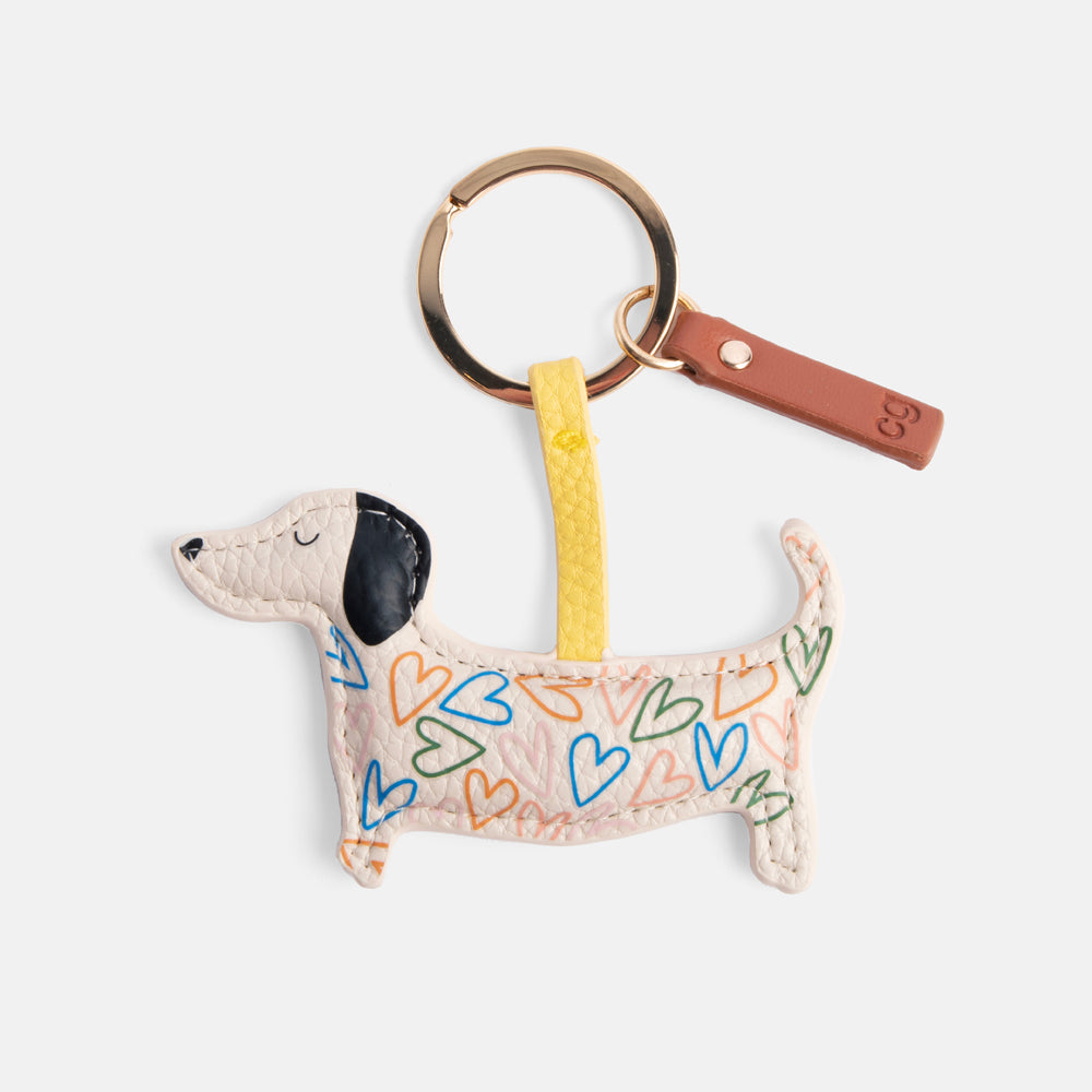 leather look padded sausage dog keyring with multi coloured hearts design