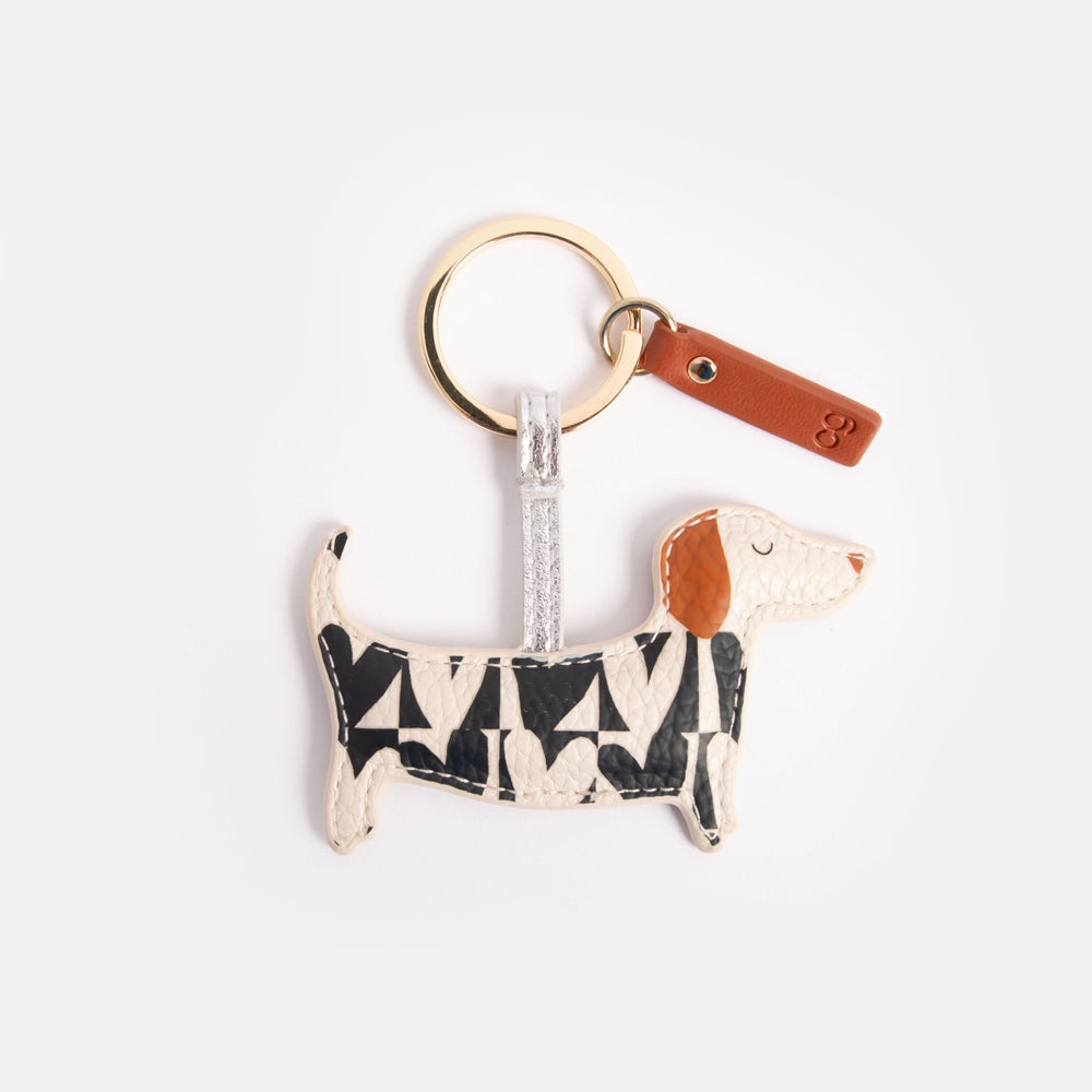 leather look PU padded sausage dog keyring in monochrome hearts print