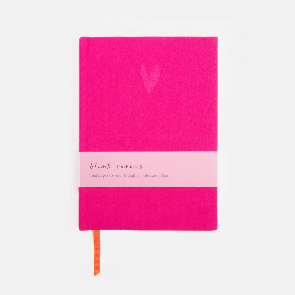 Pink notebook with a heart design on a white background