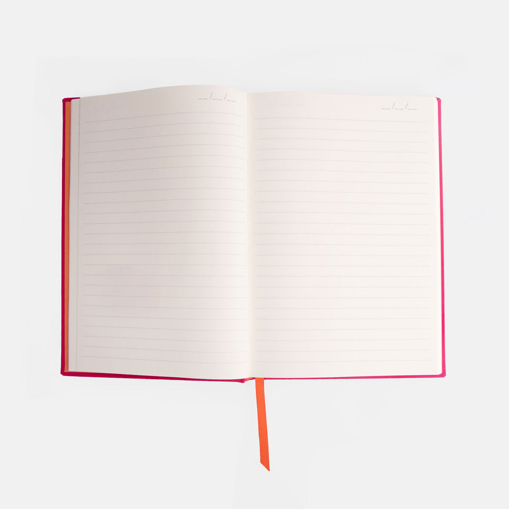 Open notebook with red binding on a white background