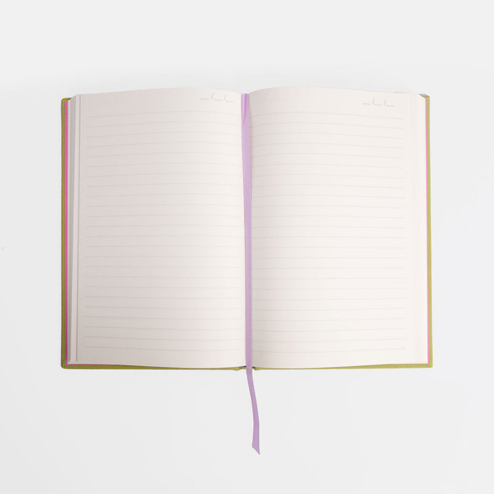Open notebook with lined pages on a white background