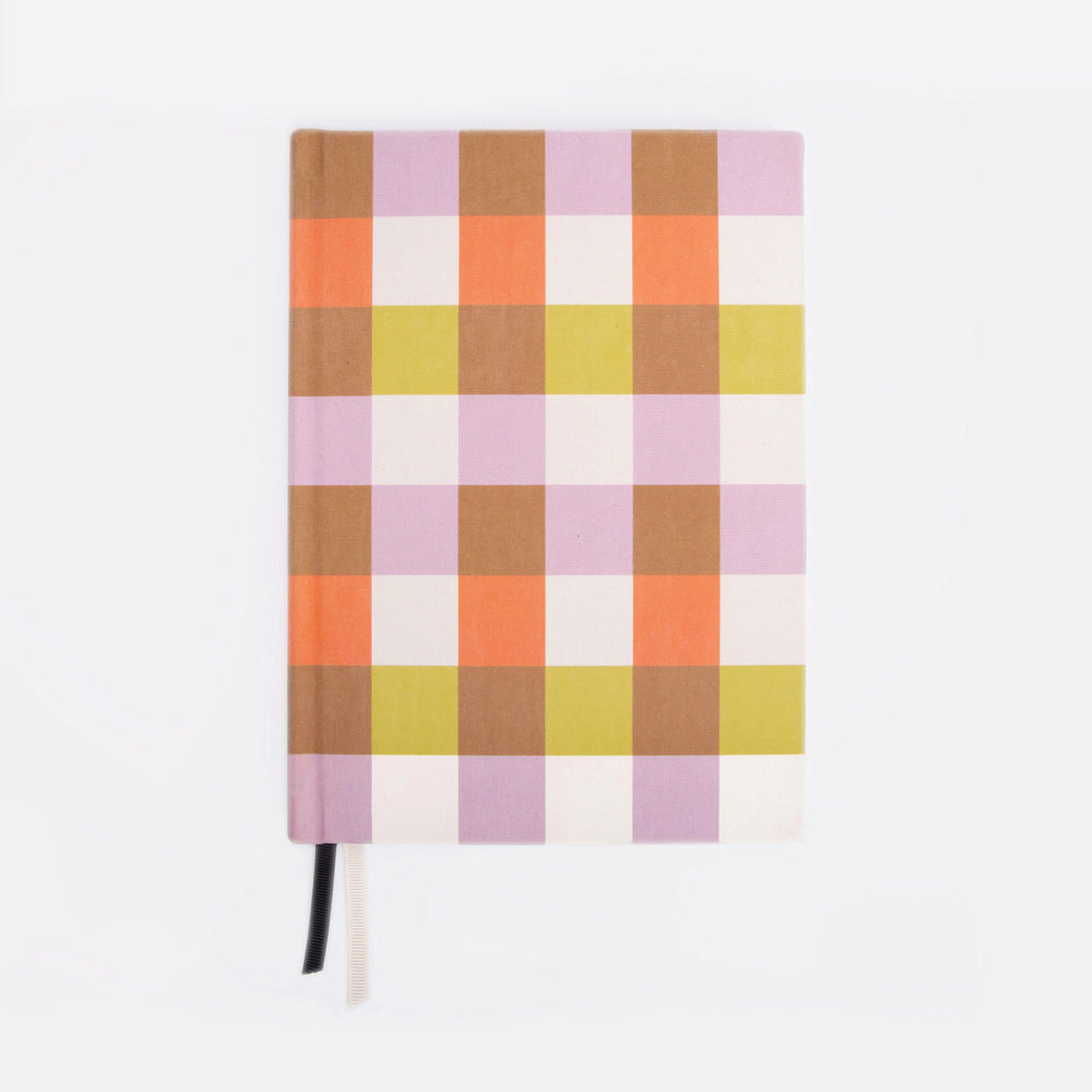 Checkered notebook with a colorful pattern on a white background