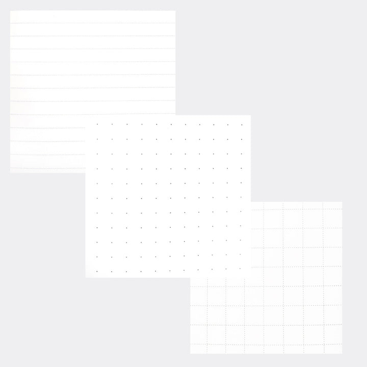 Three sheets of paper with lined, dotted and grid patterns on a light grey background