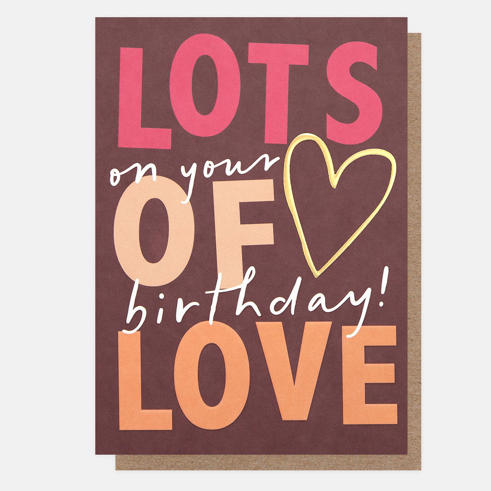 Greeting card with 'Lots of your birthday love' text on a brown background