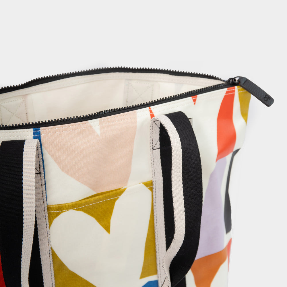 coated cotton canvas shopper style bag with bright colourful checked hearts design and unlined interior