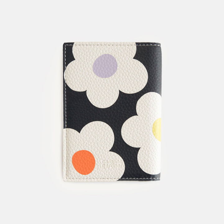 leather look PU passport & card holder in cream flowers on charcoal design with a spot print lining