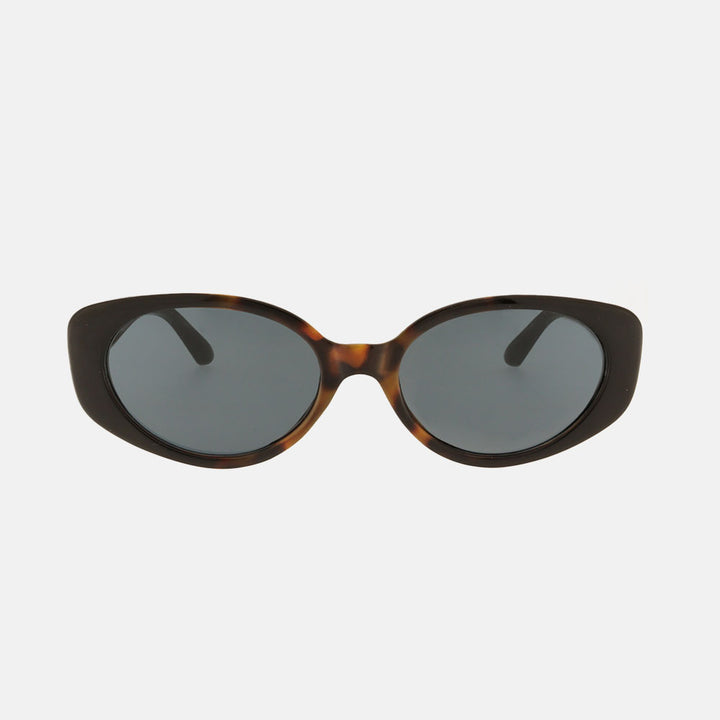 dark tortoiseshell oval frame sunglasses with grey lenses
