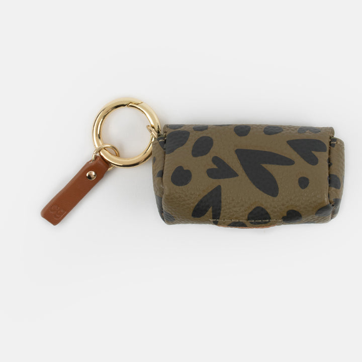 khaki and black hearts poo bag holder with gold hardware