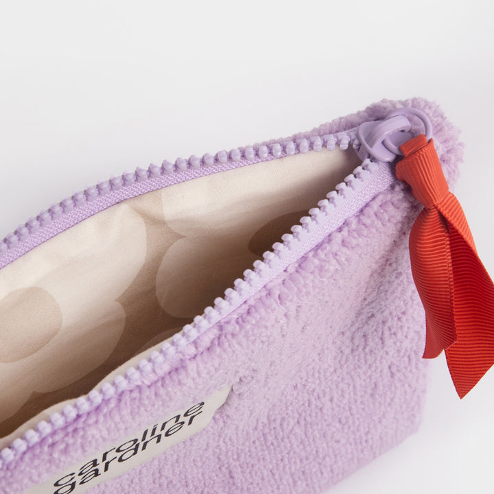 lilac towelling zip close pouch with orange zip pull