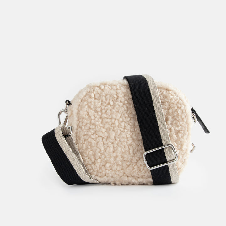 cream synthetic borg camera bag with silver zip and hardware, monochrome webbing adjustable straps and spot print lining