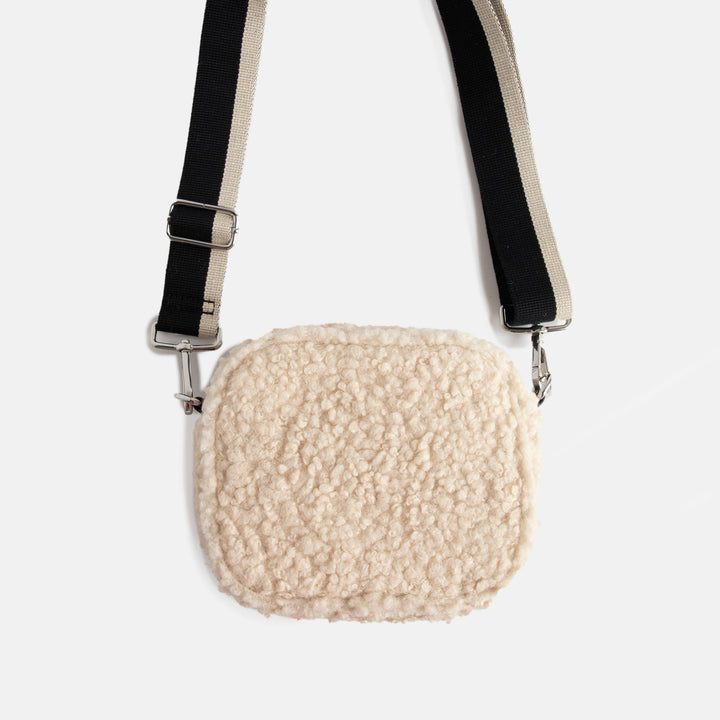 cream synthetic borg camera bag with silver zip and hardware, monochrome webbing adjustable straps and spot print lining
