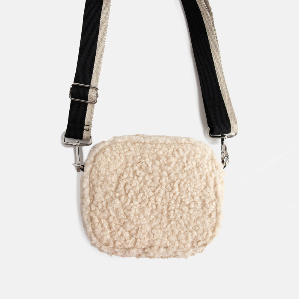 cream synthetic borg camera bag with silver zip and hardware, monochrome webbing adjustable straps and spot print lining