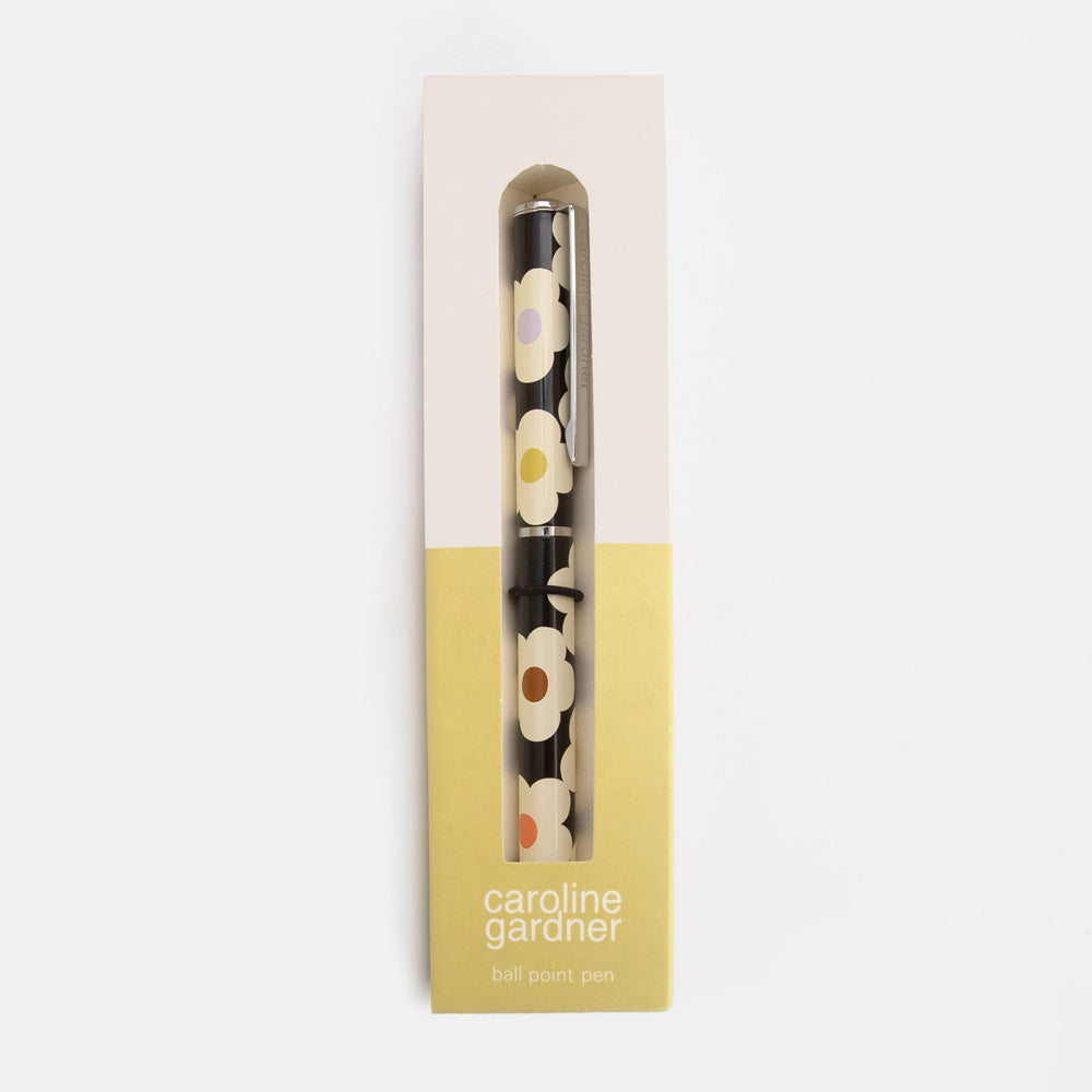 black ball point pen with colourful flowers design in a 'caroline gardner' branded box