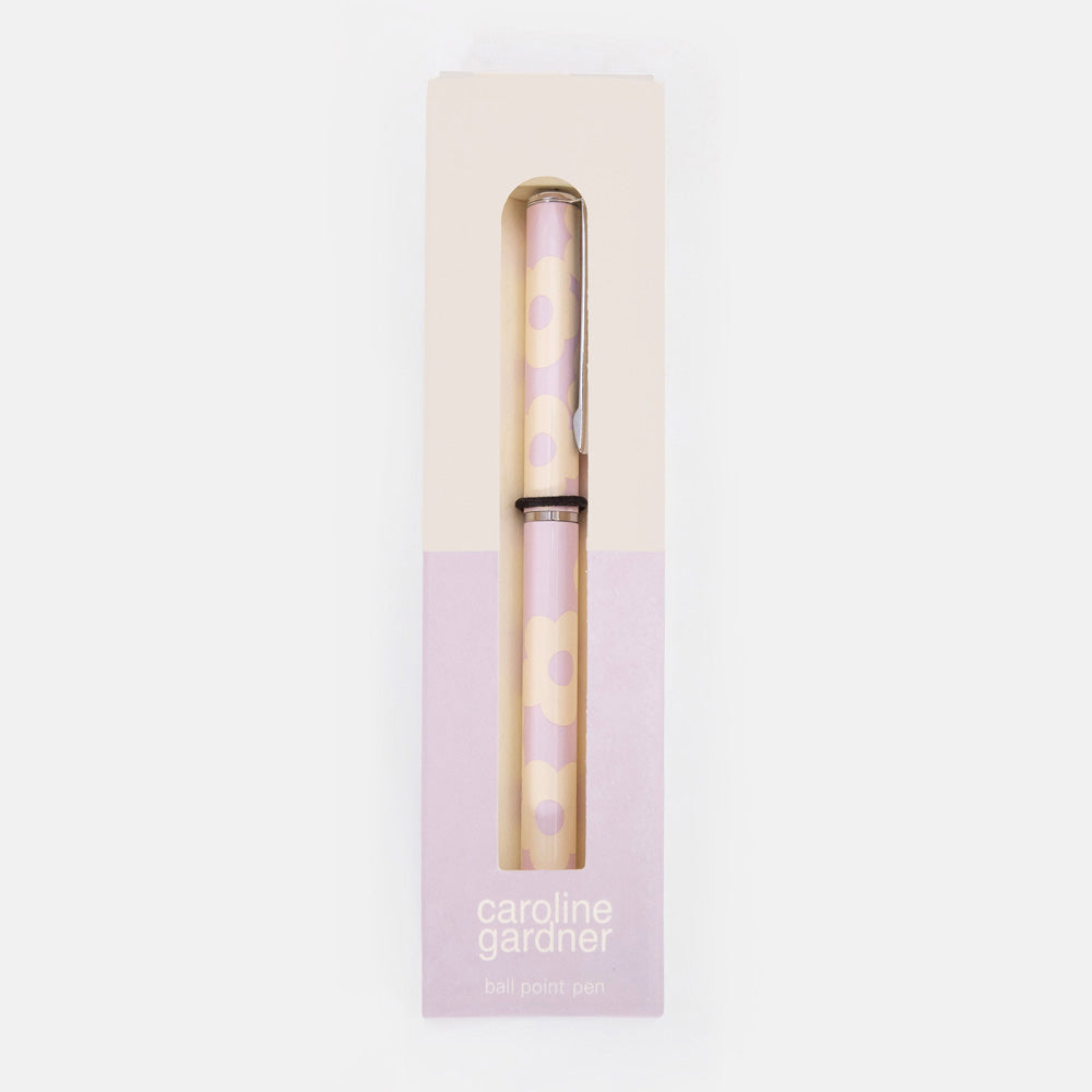 Pen with lilac flower design in a 'caroline gardner' branded box on a white background