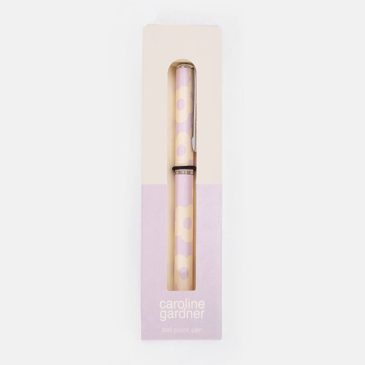 Pen with lilac flower design in a 'caroline gardner' branded box on a white background