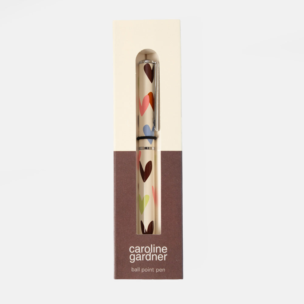 Caroline Gardner ball point pen in its original packaging, featuring a cream and brown box with a clear window showing the pen inside.