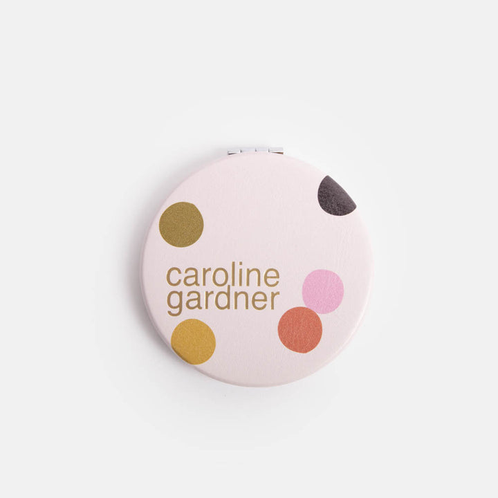 pale pink with colourful spots round pocket compact mirror