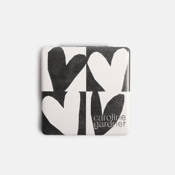 leather look PU square compact pocket mirror in monochrome checkmate hearts print