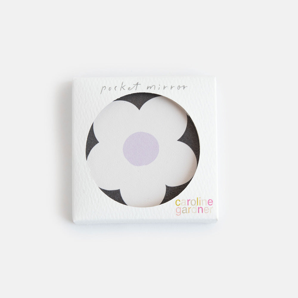 printed leather look PU round compact pocket mirror in a cream flower over charcoal print, with 2 mirrors and magnetic fastening