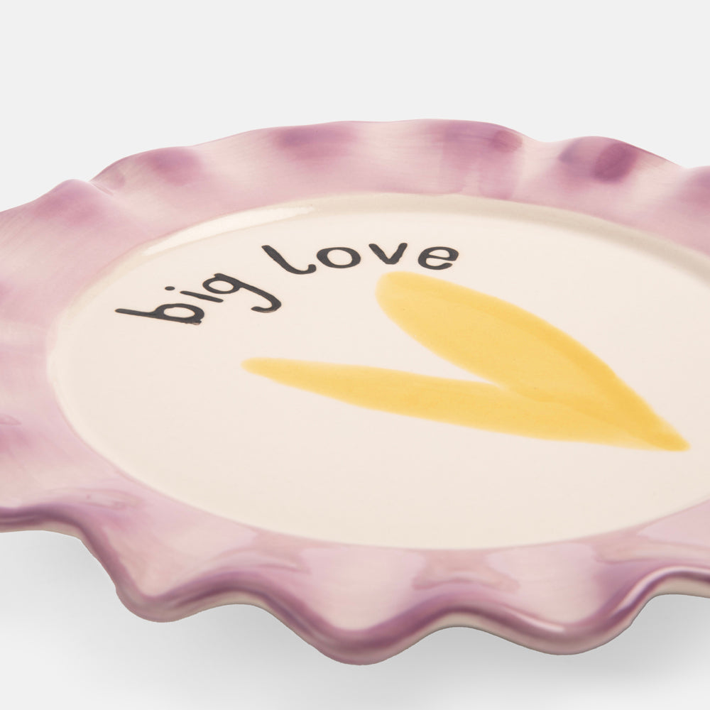 hand painted glazed stoneware plate with yellow heart design and purple scalloped edge