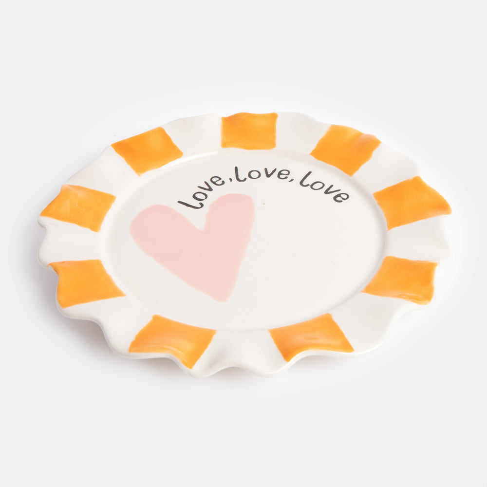 pink heart with love, love, love slogan ceramic stoneware plate with orange stripe scalloped edges