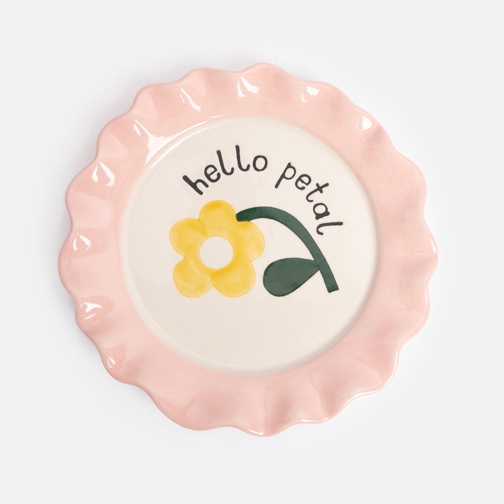 hand painted ceramic stoneware plate with pink scalloped edge and yellow flower design and hello petal slogan