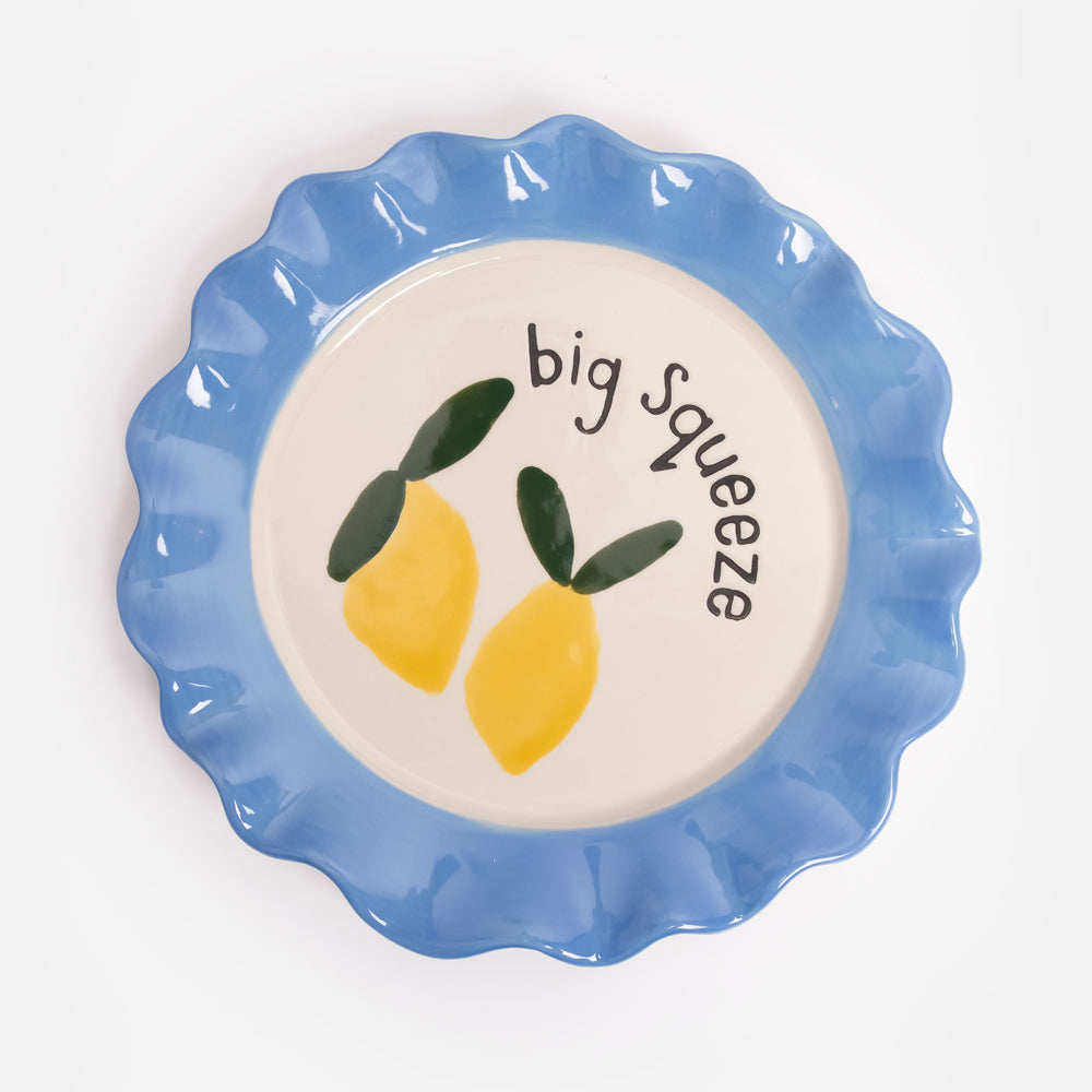 hand painted ceramic stoneware scalloped edge plate with yellow lemons, big squeeze slogan and blue trim