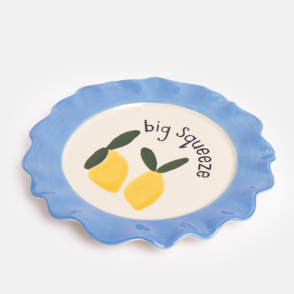 hand painted ceramic stoneware scalloped edge plate with yellow lemons, big squeeze slogan and blue trim