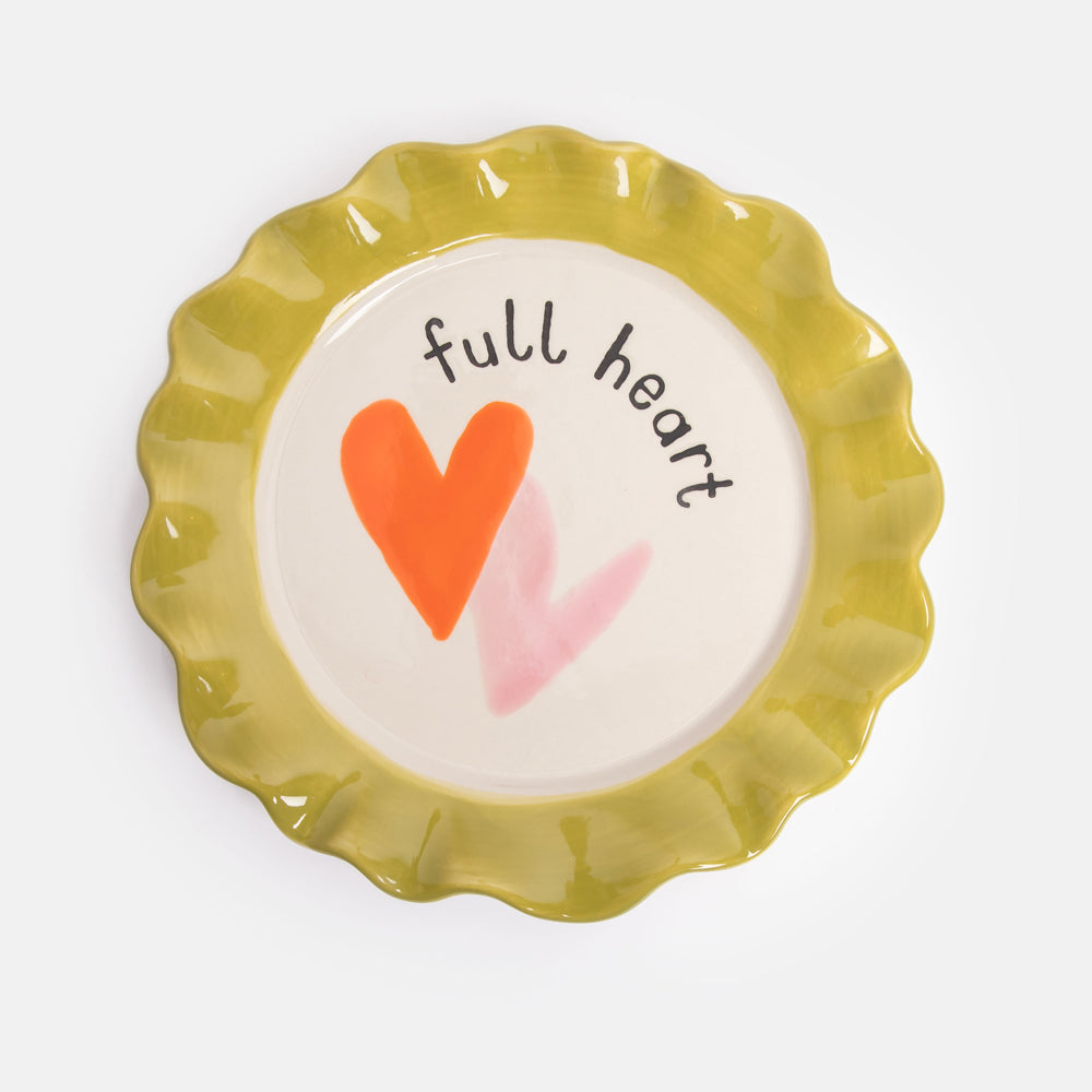 hand painted ceramic stoneware plate with green scalloped edge, double hearts design and 'full heart' slogan