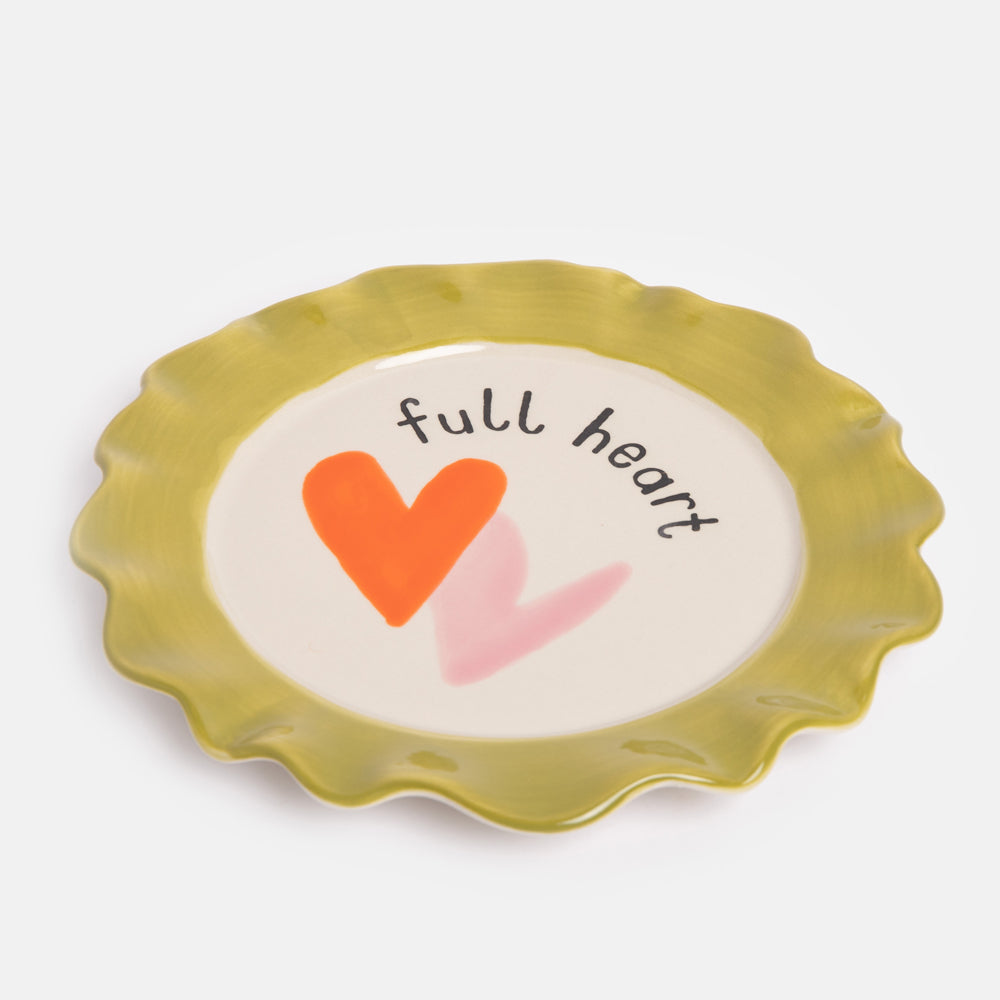 hand painted ceramic stoneware plate with green scalloped edge, double hearts design and 'full heart' slogan