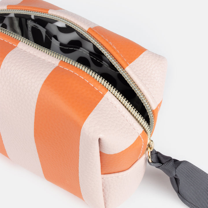 pink and orange stripe leather look mini cube cosmetics bag with monochrome hearts lining