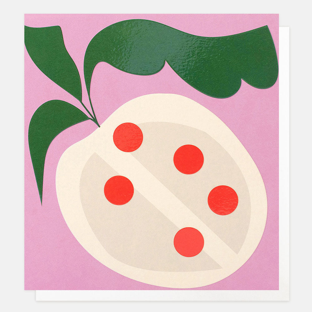 a greetings cards with a stylised illustration of a fruit in off-white with red seeds and green leaves on a pink background