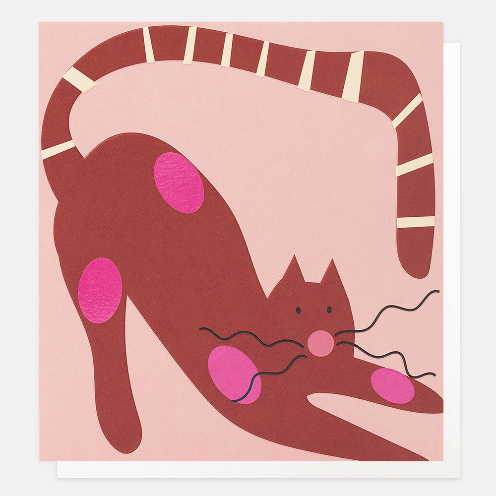 A minimalist greetings card featuring a stylized brown cat stretching on a light pink background, with bright pink circular spots and cream stripes along its tail.