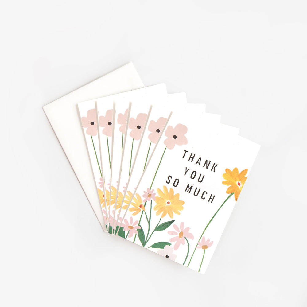 pack of 6 thank you cards featuring a pink & yellow flowers design and the text 'thank you so much' 
