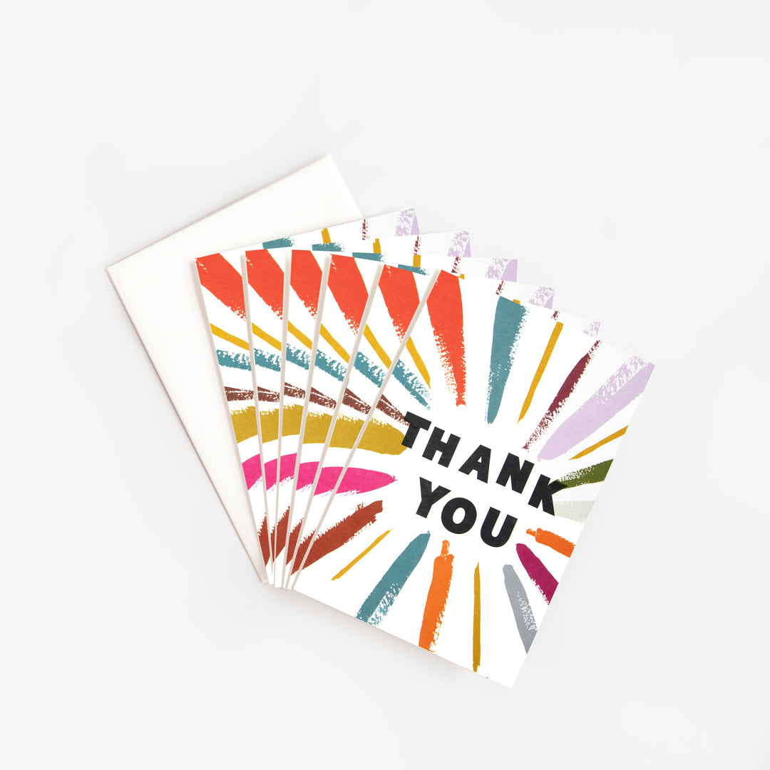 Set of colorful 'Thank You' cards on a white background