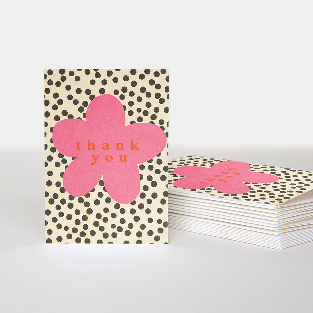 pack of 10 blank notecards featuring a pink flower over a dotty background and the message 'thank you'