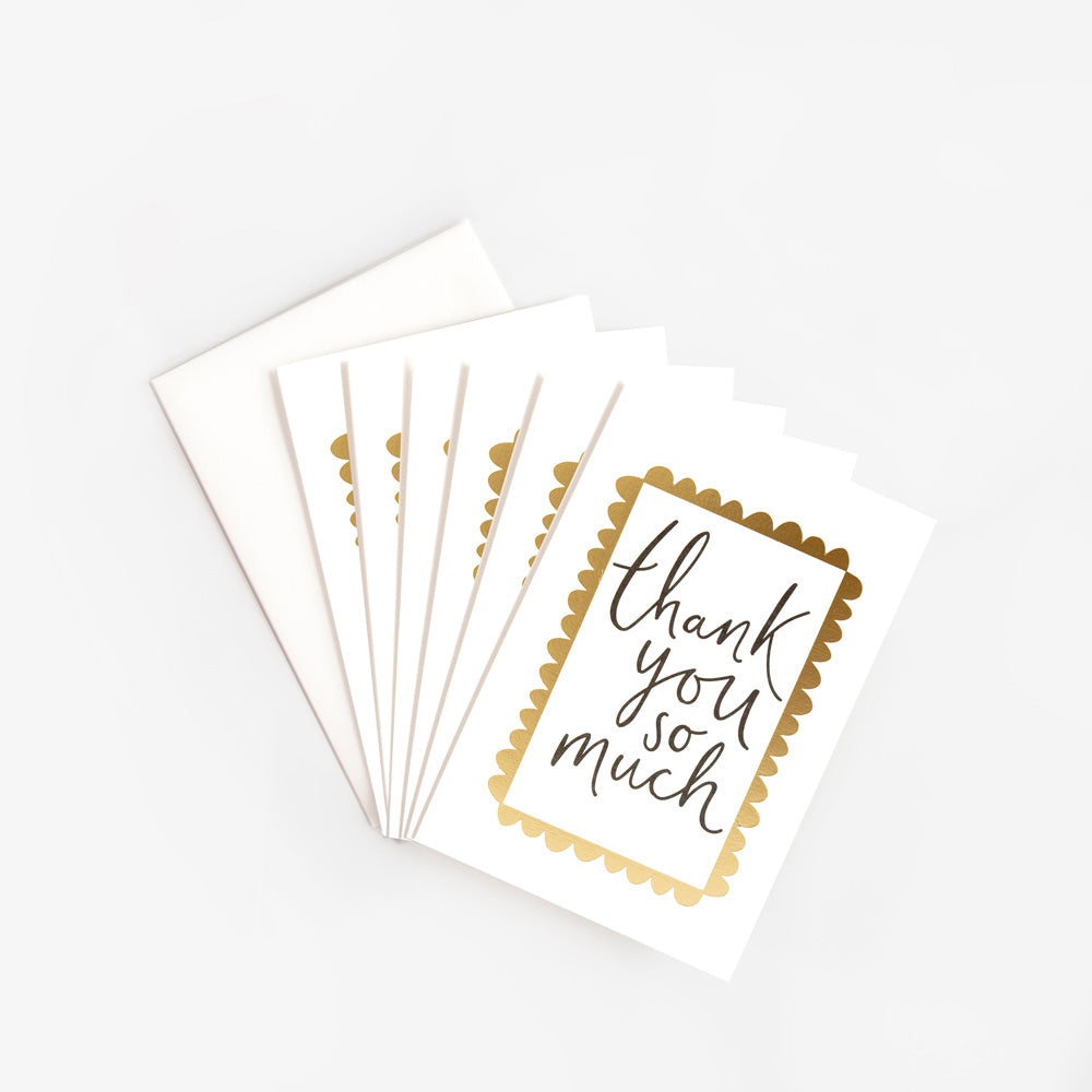pack of 6 thank you cards with the text 'thank you so much' inside a gold scalloped edge frame on a white background