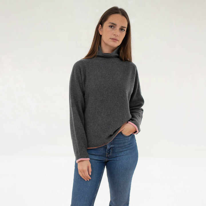 ash grey pure cashmere jumper with pink cuff trim and brown waist trim, made by Cocoa Cashmere